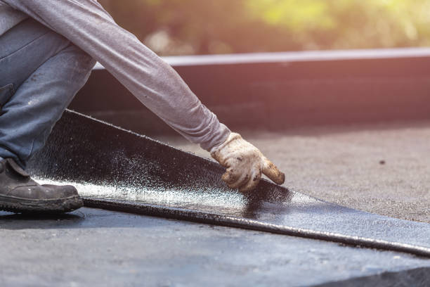 Professional Basement Waterproofing technician working in Oxford, MI